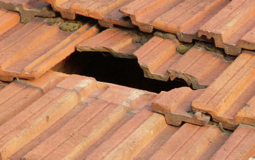 roof repair Whiddon Down, Devon